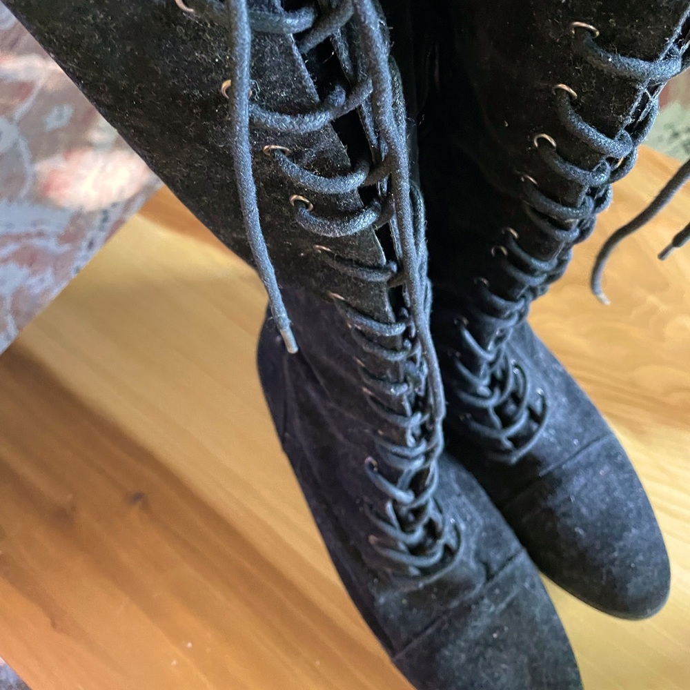 Knee high, laced boots!
